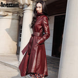 Nerazzurri Asymmetrical leather trench coat for women 2021 long sleeve belt Fall long faux leather coats women Plus size fashion